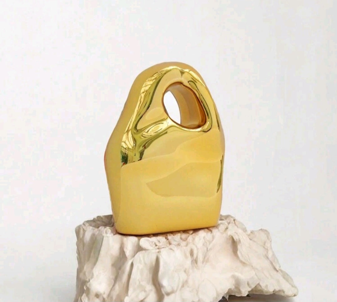 Asymmetrical shape acrylic rock evening bag