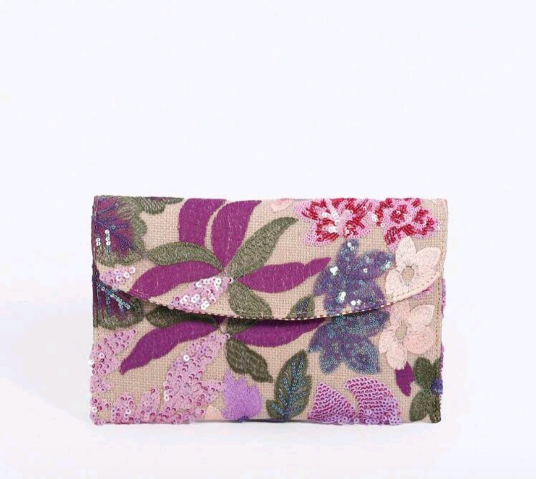 Flower print sequence clutch bag